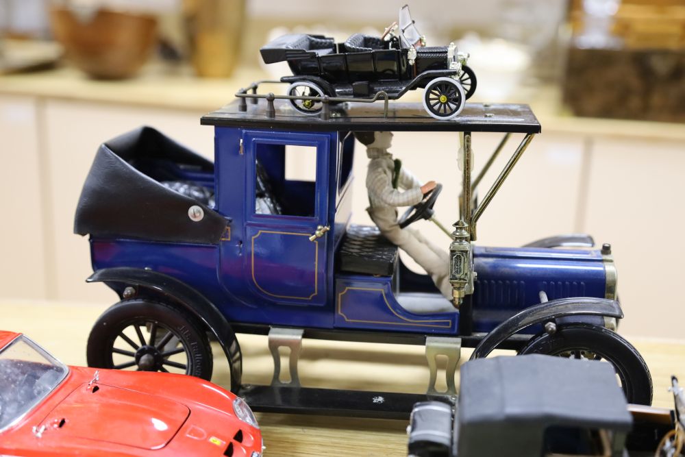 Eight tinplate model cars including a Ferrari and a Corvette